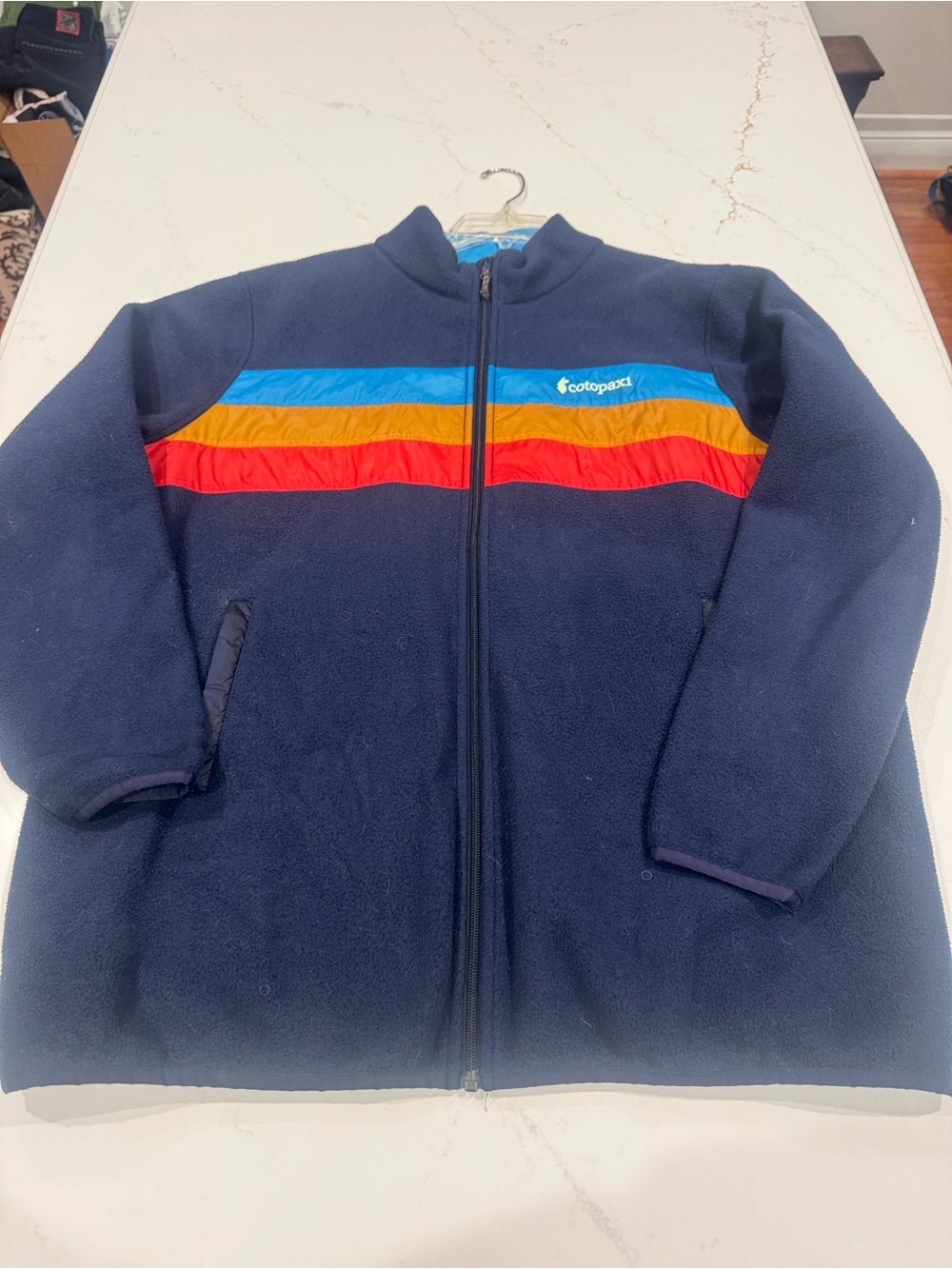 cotopaxi Navy Men’s  Teca Fleece Jacket with Blue, Gold & Red Stripes
